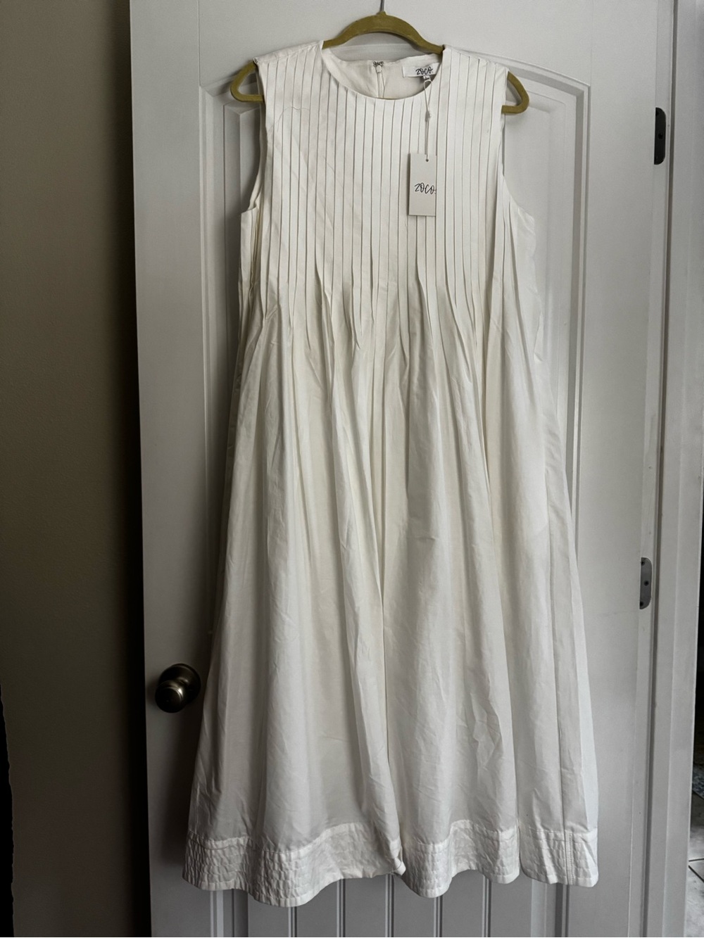 Sleeveless White Pleated Midi Dress